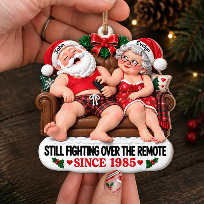 Personalized Still Fighting Over the Remote Santa Couple Red Sleepwear Sofa Anniversary Wood Christmas Ornament – Gift for Couples