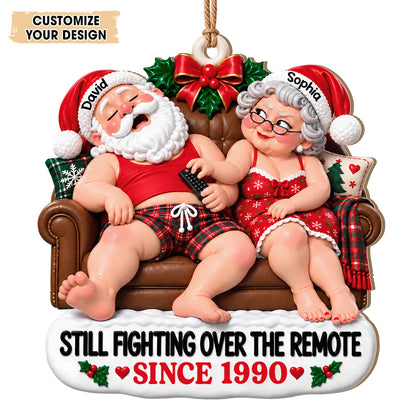 Personalized Still Fighting Over the Remote Santa Couple Red Sleepwear Sofa Anniversary Wood Christmas Ornament – Gift for Couples